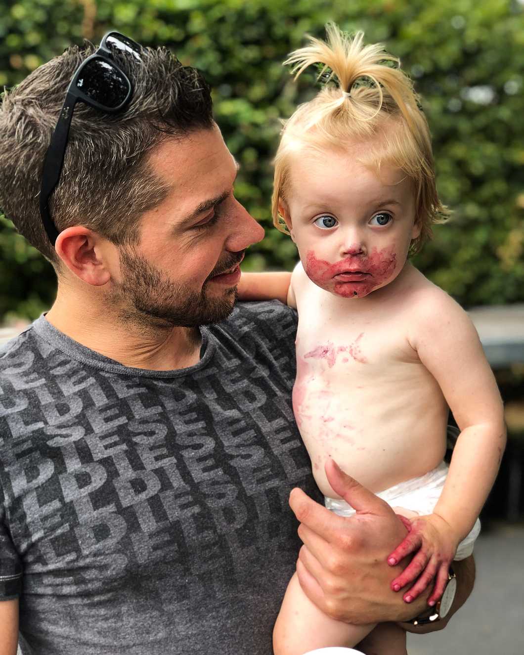 father holding a child