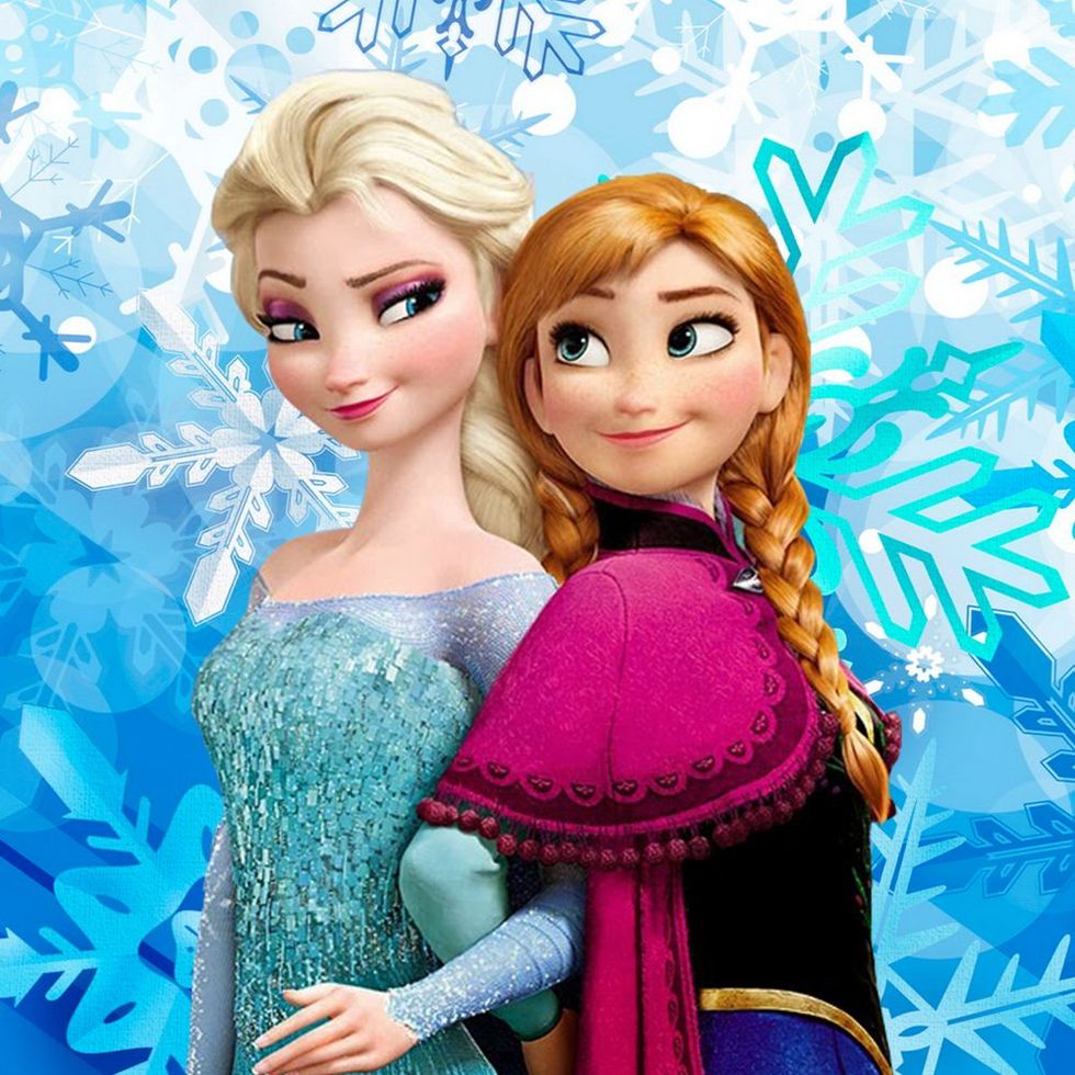 Frozen princesses' Elsa and Anna standing next to each other.