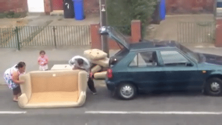 Giph with people putting their sofa on the truck of the car.