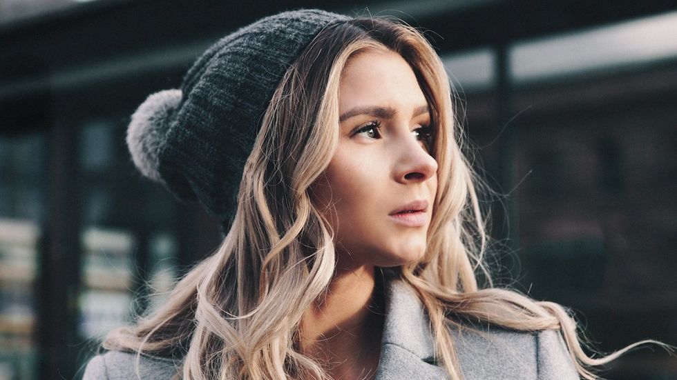 girl holding a smile