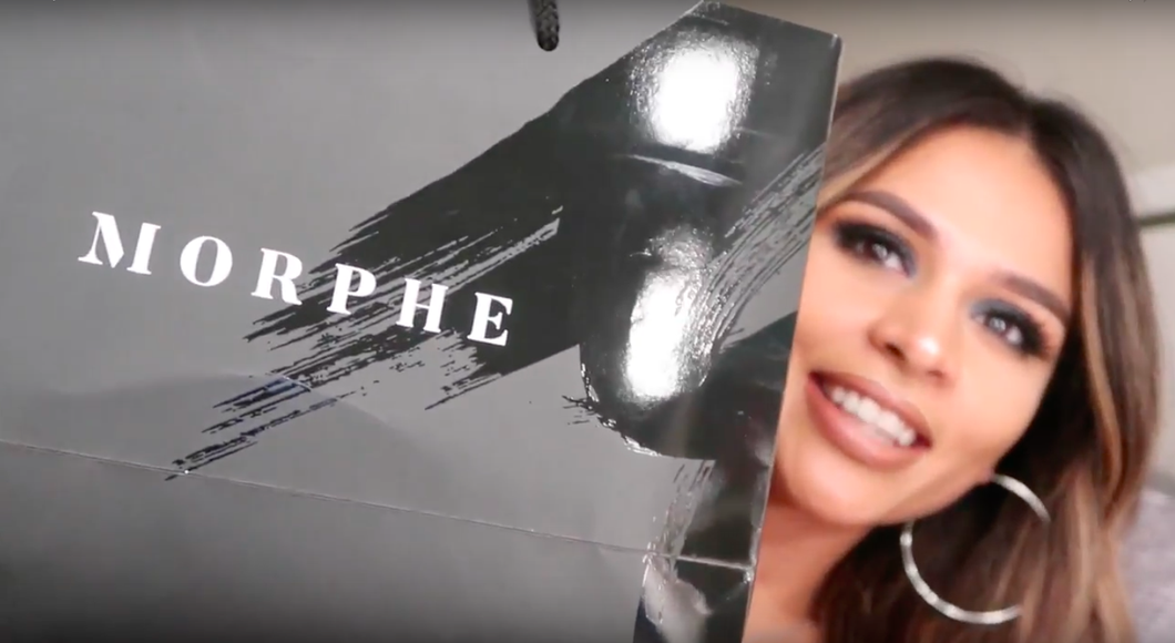 girl holding morphe palette