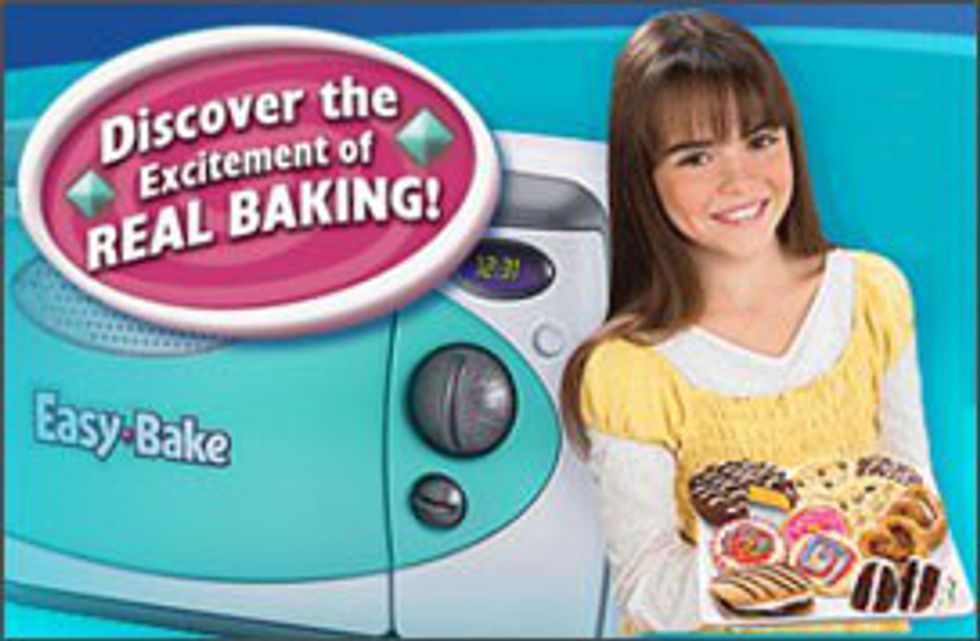 Girl holding tray of sweet treats with easy bake over