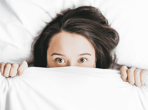 Girl laying in bed