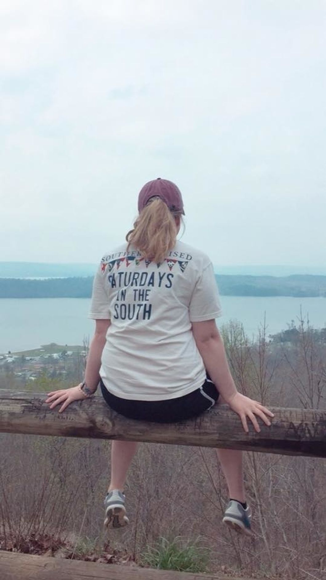 girl looking out over water