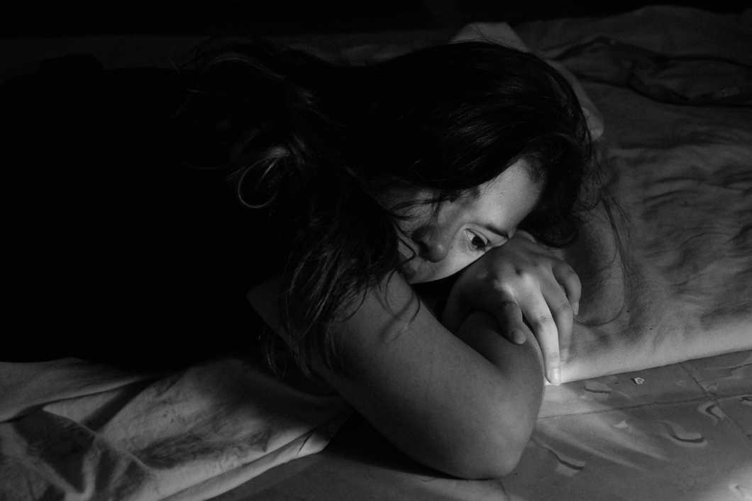 Girl lying in bed