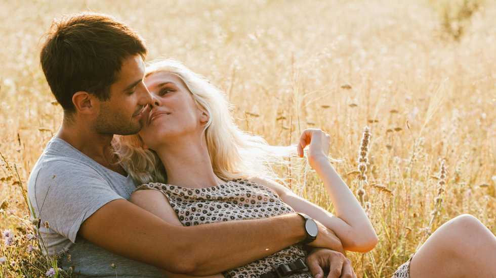 Girl pinching her boyfriend's nose