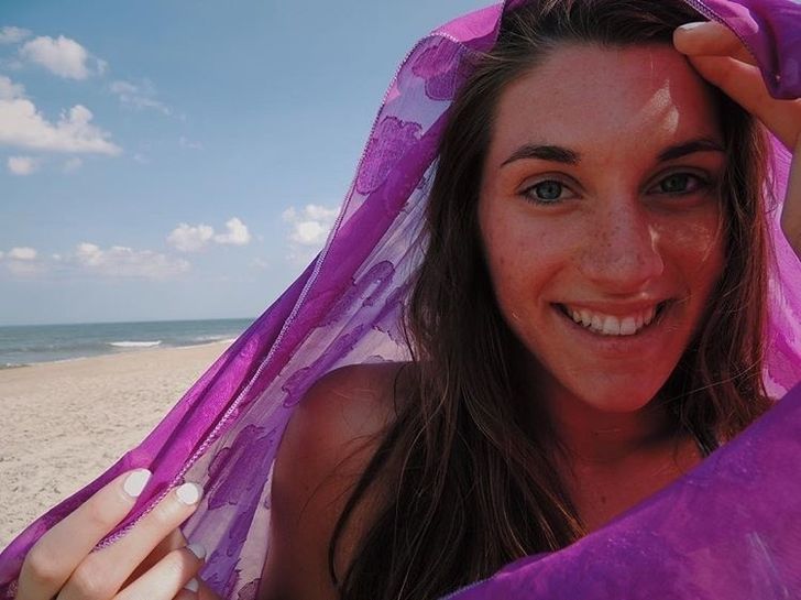girl smiling on beach