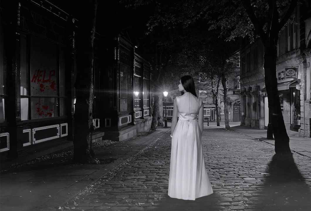 girl standing in street