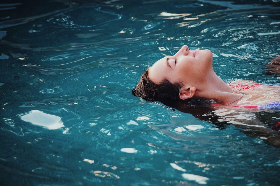 Girl swimming in a pool