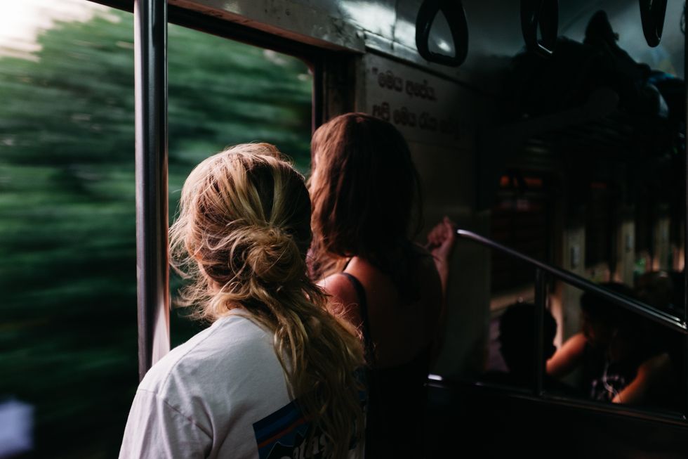 girl traveling on train