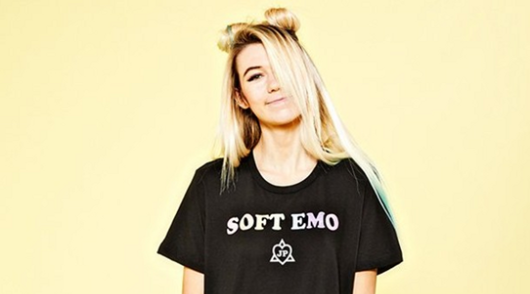 Girl wearing a "soft emo" shirt from Hot Topic