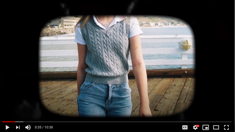 Girl wearing a sweater vest 