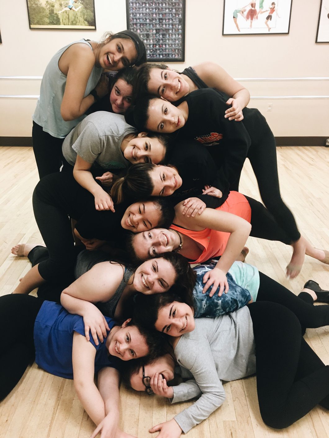 girls in dance class posing for photo together
