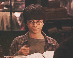 Harry Potter waving a wand