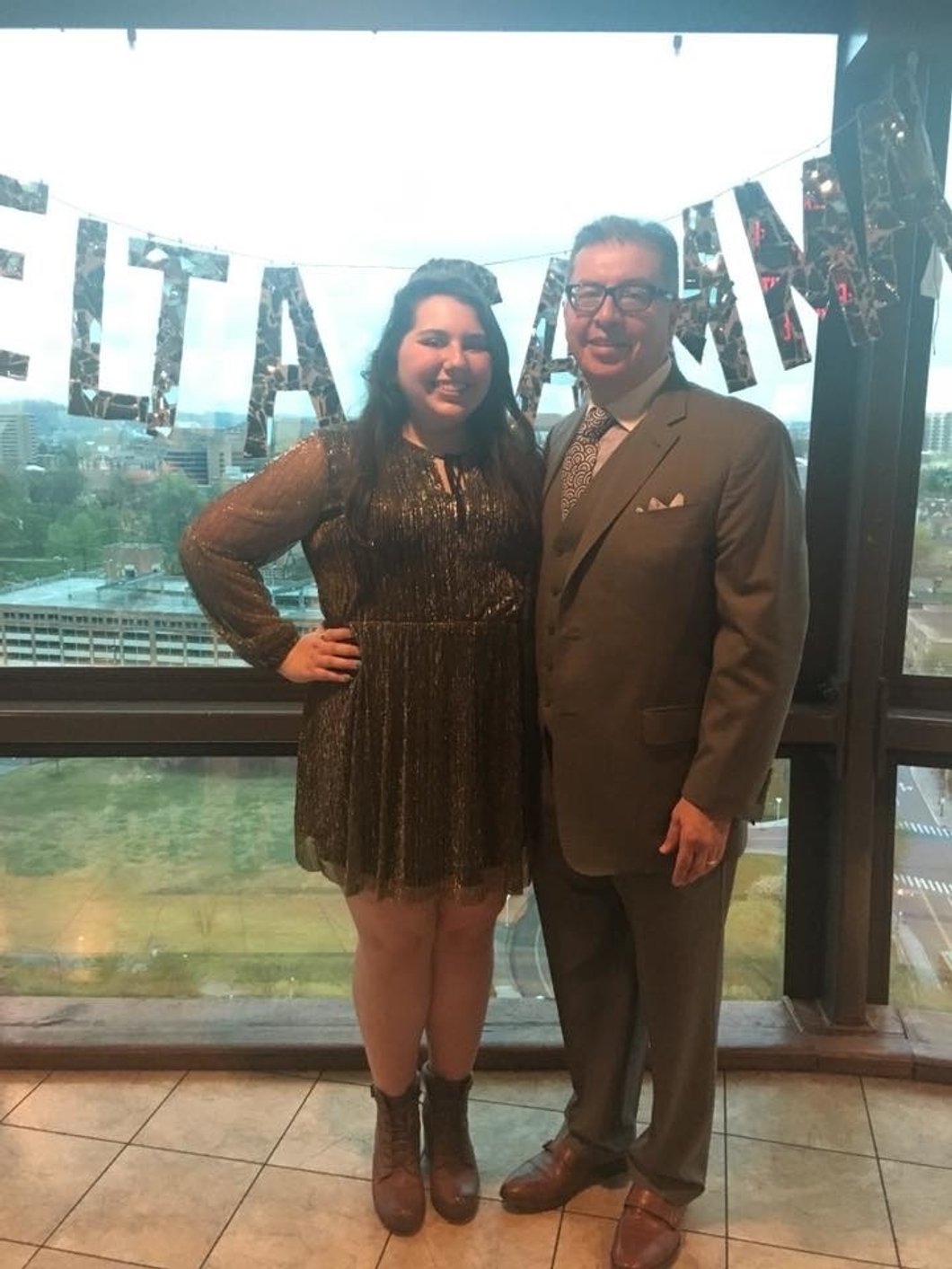 hispanic father and daughter