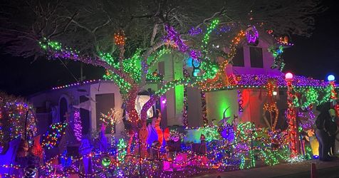 house decked out in holiday lights for christmas season