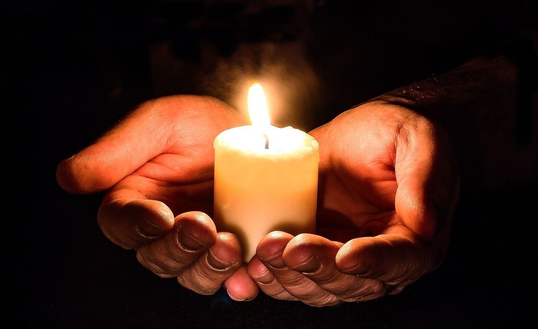 https://pixabay.com/photos/hands-open-candle-candlelight-1926414/