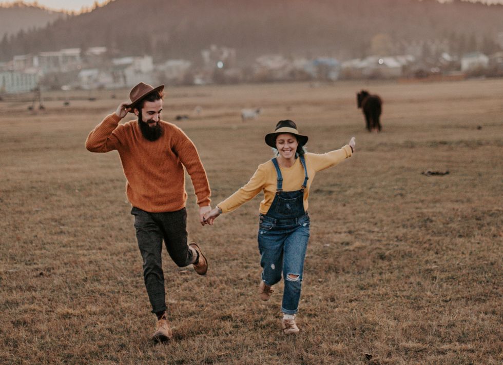 https://unsplash.com/search/photos/couple-in-field