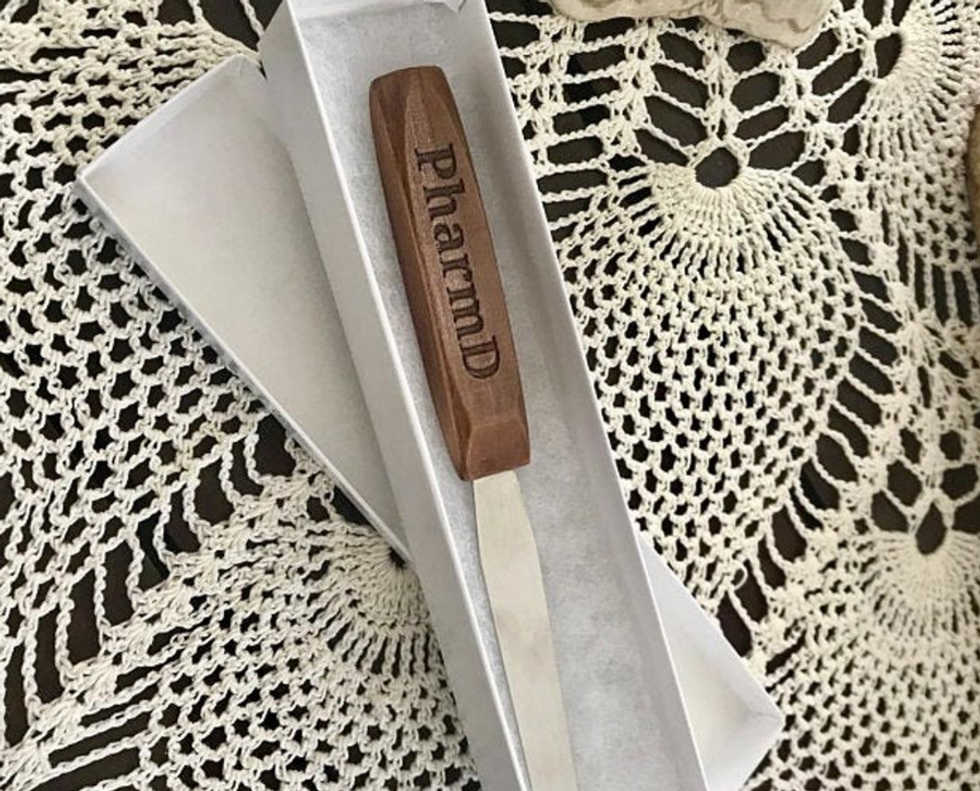 https://www.etsy.com/listing/737735053/pharmacist-spatula-garebear-personalized?ga_order=most_relevant&ga_search_type=all&ga_view_type=gallery&ga_search_query=graduation+gifts+science&ref=sc_gallery-1-3&plkey=0fda09fbbce1109e4c0ed787f13d0bfd400e8483%3A737735053&frs=1
