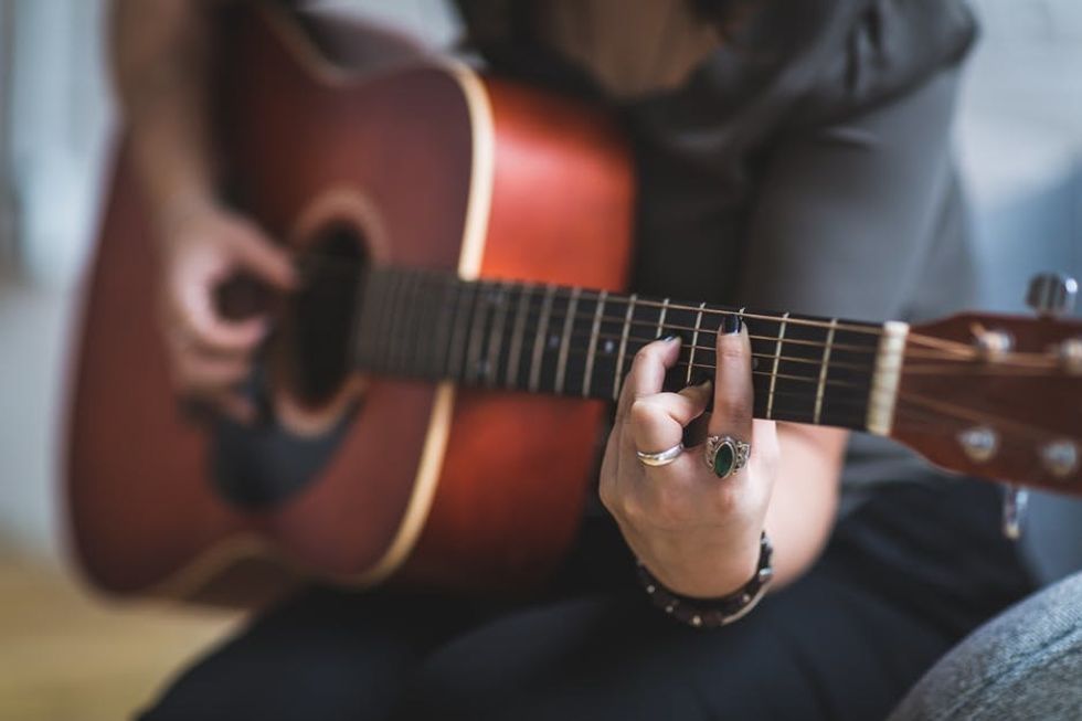 https://www.pexels.com/photo/acoustic-acoustic-guitar-adult-blur-374711/