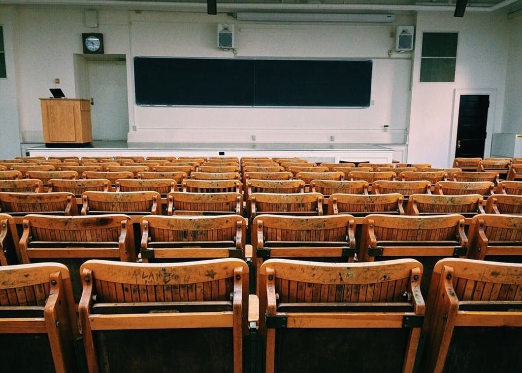 https://www.pexels.com/photo/auditorium-benches-chairs-class-207691/