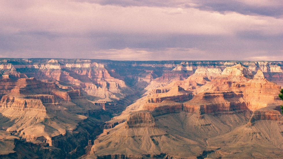 https://www.pexels.com/photo/canyon-clouds-dawn-desert-154140/
