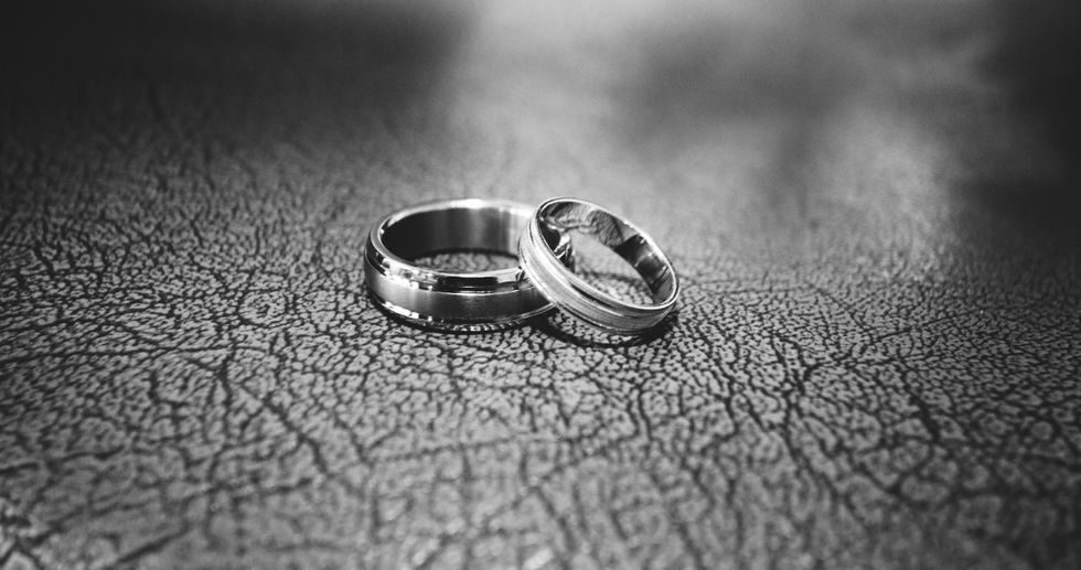 https://www.pexels.com/photo/close-up-of-wedding-rings-on-floor-17834/