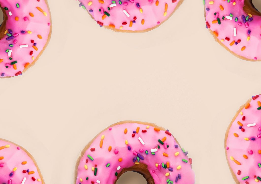 https://www.pexels.com/photo/close-up-photo-of-pink-donuts-1982485/