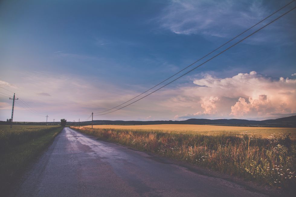 https://www.pexels.com/photo/concrete-road-between-grass-fields-1137337/