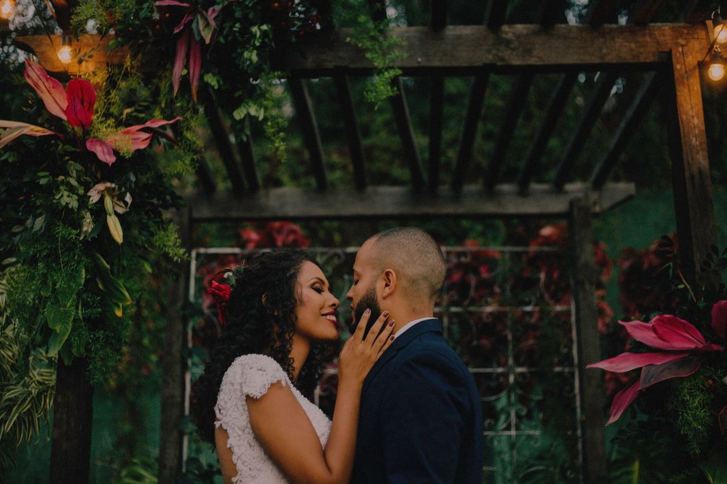 https://www.pexels.com/photo/couple-under-garden-arch-surrounded-with-flowers-679568/