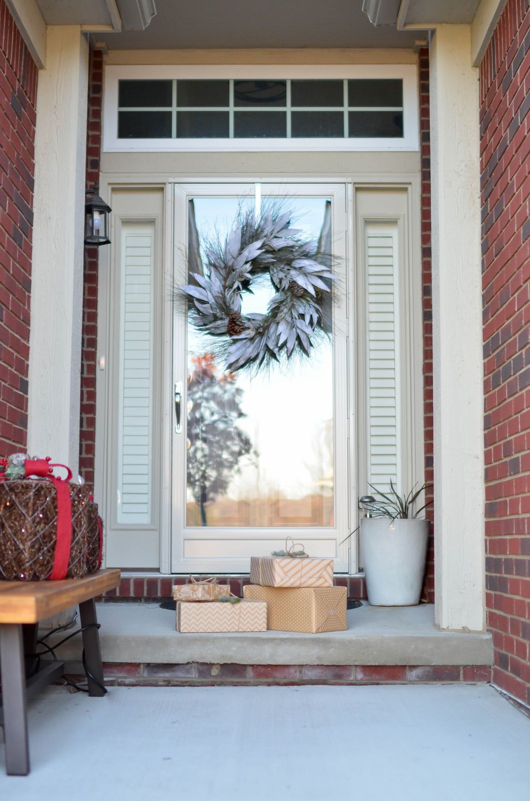 https://www.pexels.com/photo/four-brown-gift-boxes-near-a-glass-paneled-door-with-wreath-712319/