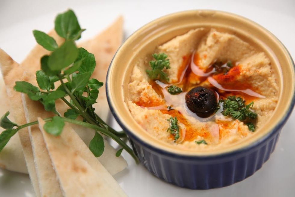 https://www.pexels.com/photo/fresh-hummus-and-pita-bread-1618898/