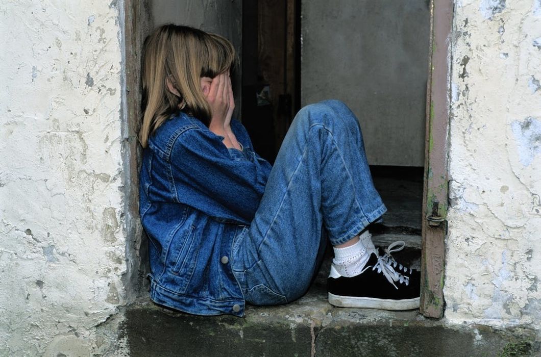 https://www.pexels.com/photo/girl-jeans-kid-loneliness-236215/