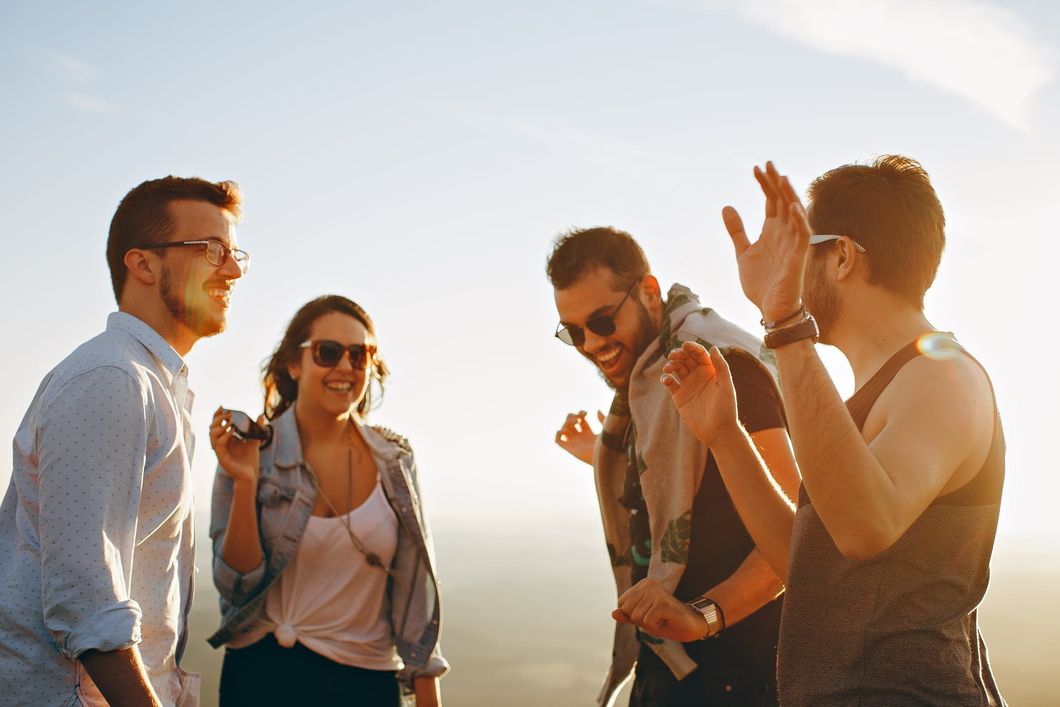 https://www.pexels.com/photo/group-of-people-having-fun-together-under-the-sun-708392/