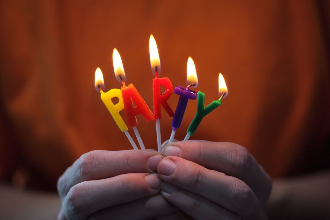https://www.pexels.com/photo/lighted-party-letter-candles-1476674/