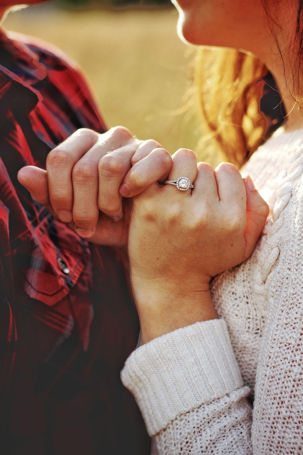 https://www.pexels.com/photo/man-and-woman-holding-hands-1483740/