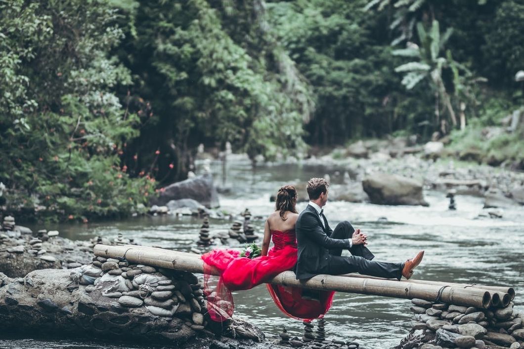 https://www.pexels.com/photo/man-and-woman-sitting-on-bamboos-1139846/