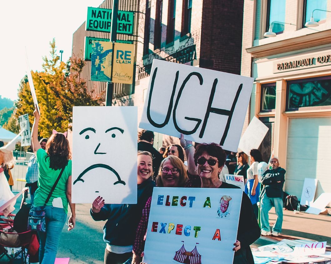 https://www.pexels.com/photo/people-holding-banners-1464227/