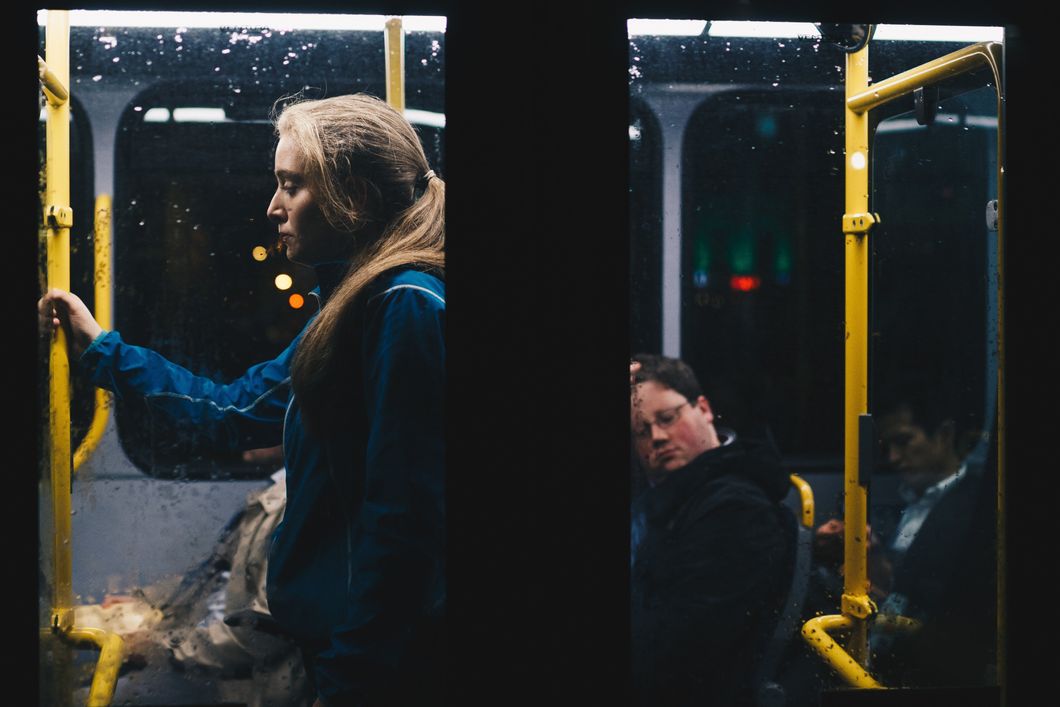 https://www.pexels.com/photo/photo-of-a-woman-standing-inside-bus-808700/