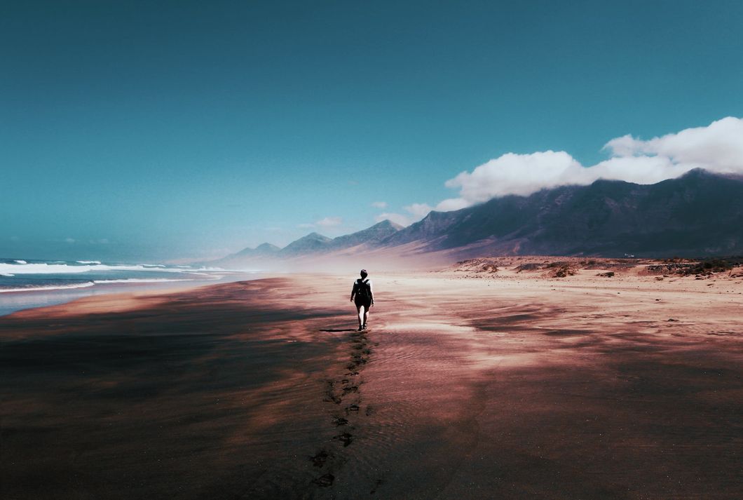 https://www.pexels.com/photo/photo-of-person-walking-on-deserted-island-934718/