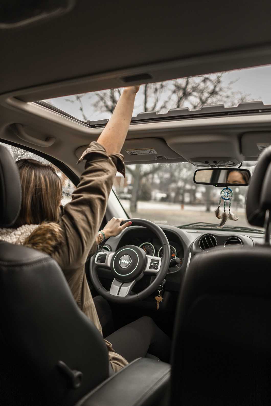 https://www.pexels.com/photo/photo-of-woman-driving-car-1051071/