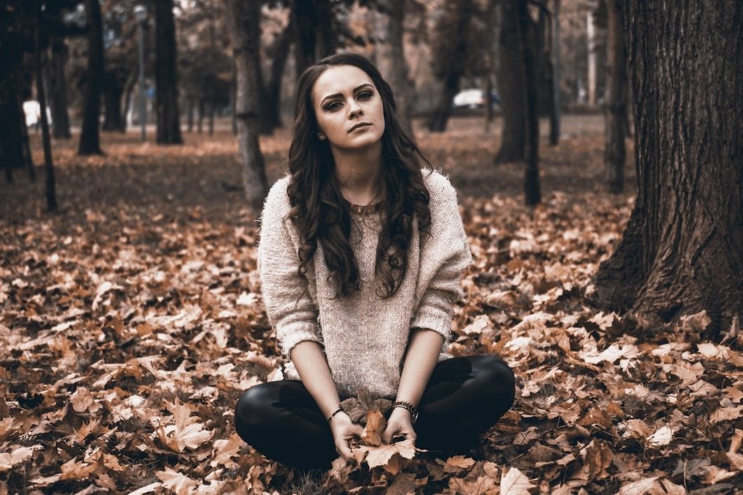 https://www.pexels.com/photo/portrait-of-a-young-woman-in-forest-326603/