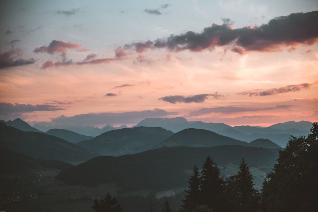 https://www.pexels.com/photo/scenic-view-of-mountains-during-dawn-1261728/