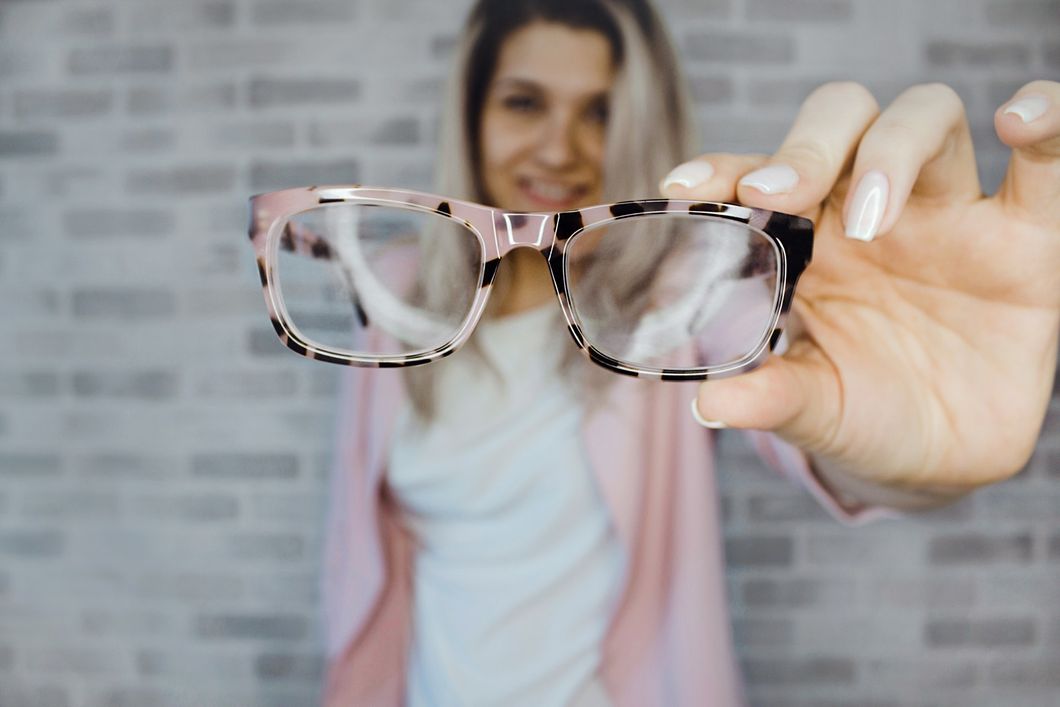 https://www.pexels.com/photo/selective-focus-photography-of-pink-and-black-framed-eyeglasses-975668/