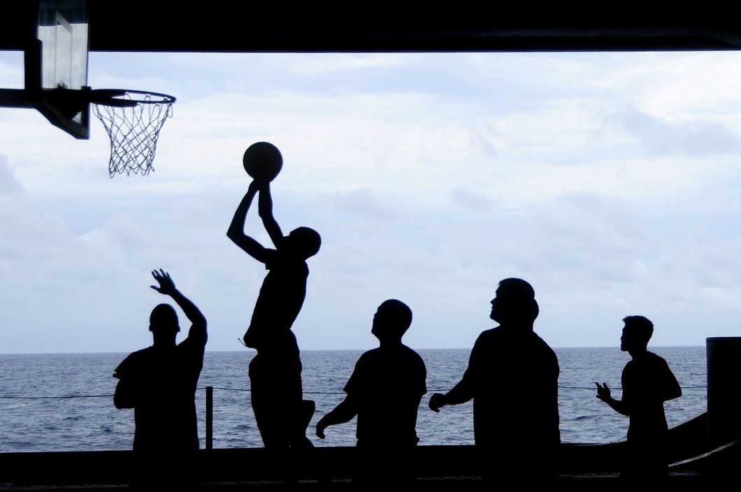 https://www.pexels.com/photo/silhouette-of-men-playing-basketball-69773/