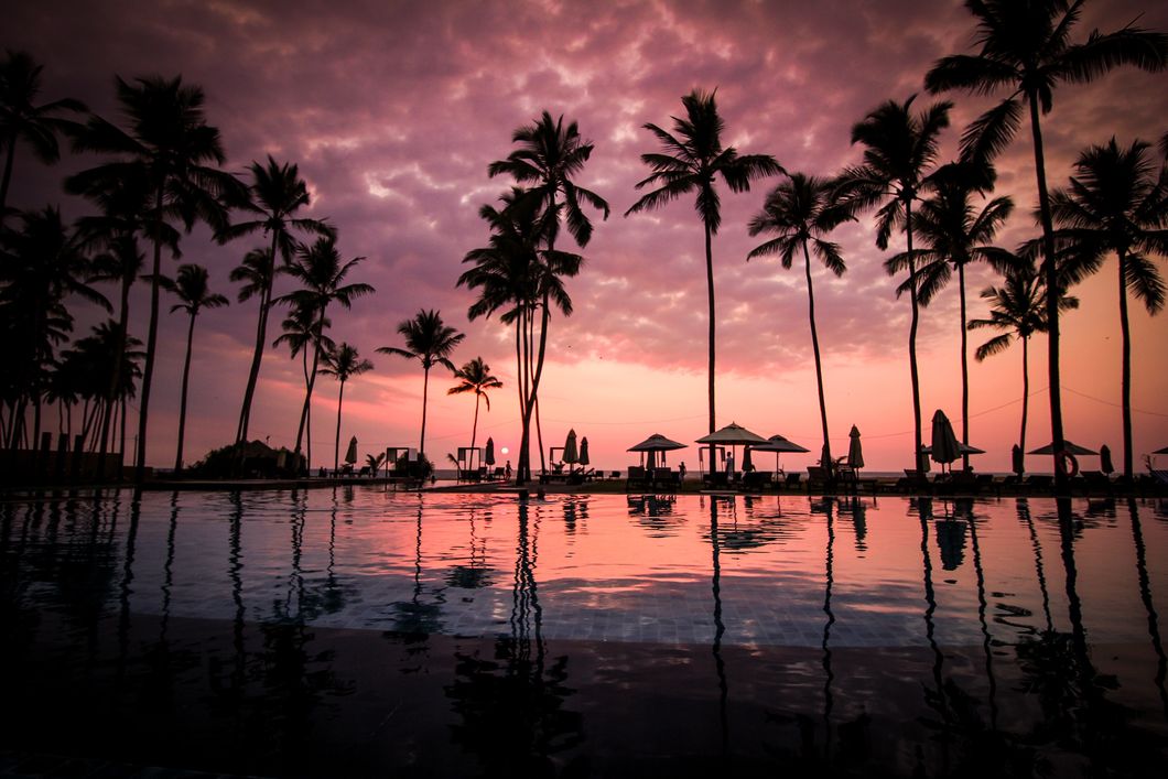 https://www.pexels.com/photo/sky-sunset-beach-vacation-60217/