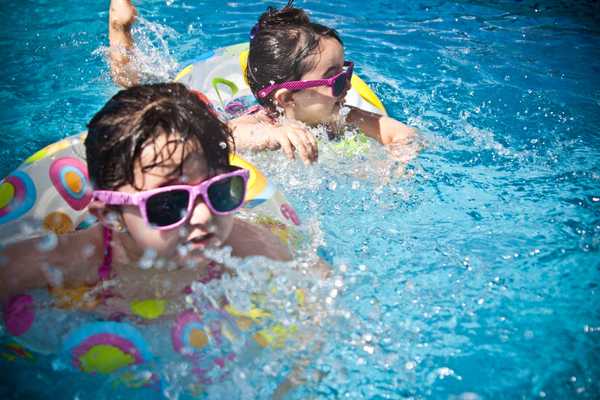 https://www.pexels.com/photo/sunglasses-girl-swimming-pool-swimming-61129/