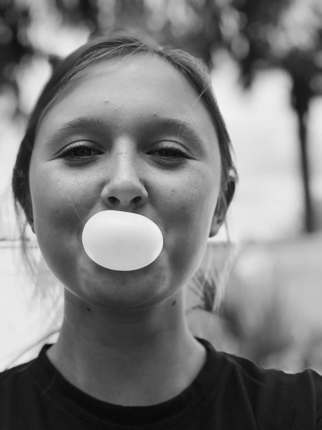 https://www.pexels.com/photo/woman-blowing-bubblegum-1564192/
