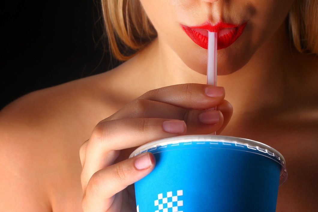 https://www.pexels.com/photo/woman-holding-blue-and-white-disposable-cup-in-closeup-photography-1161928/