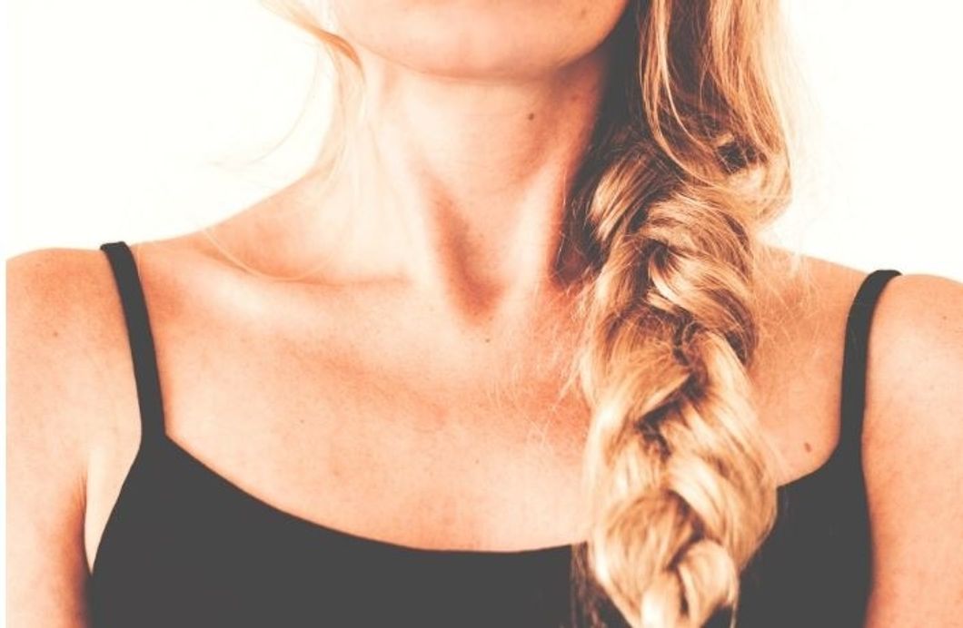 https://www.pexels.com/photo/woman-in-black-tank-top-with-braided-hair-167704/